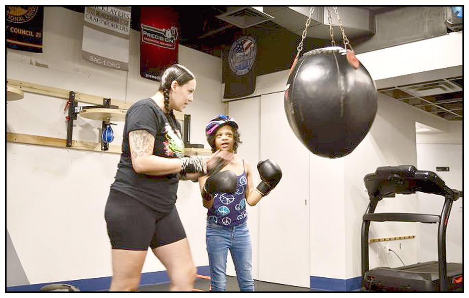 Down kids boxing at Costello's gym